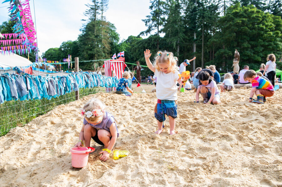children playing in a sand pit 