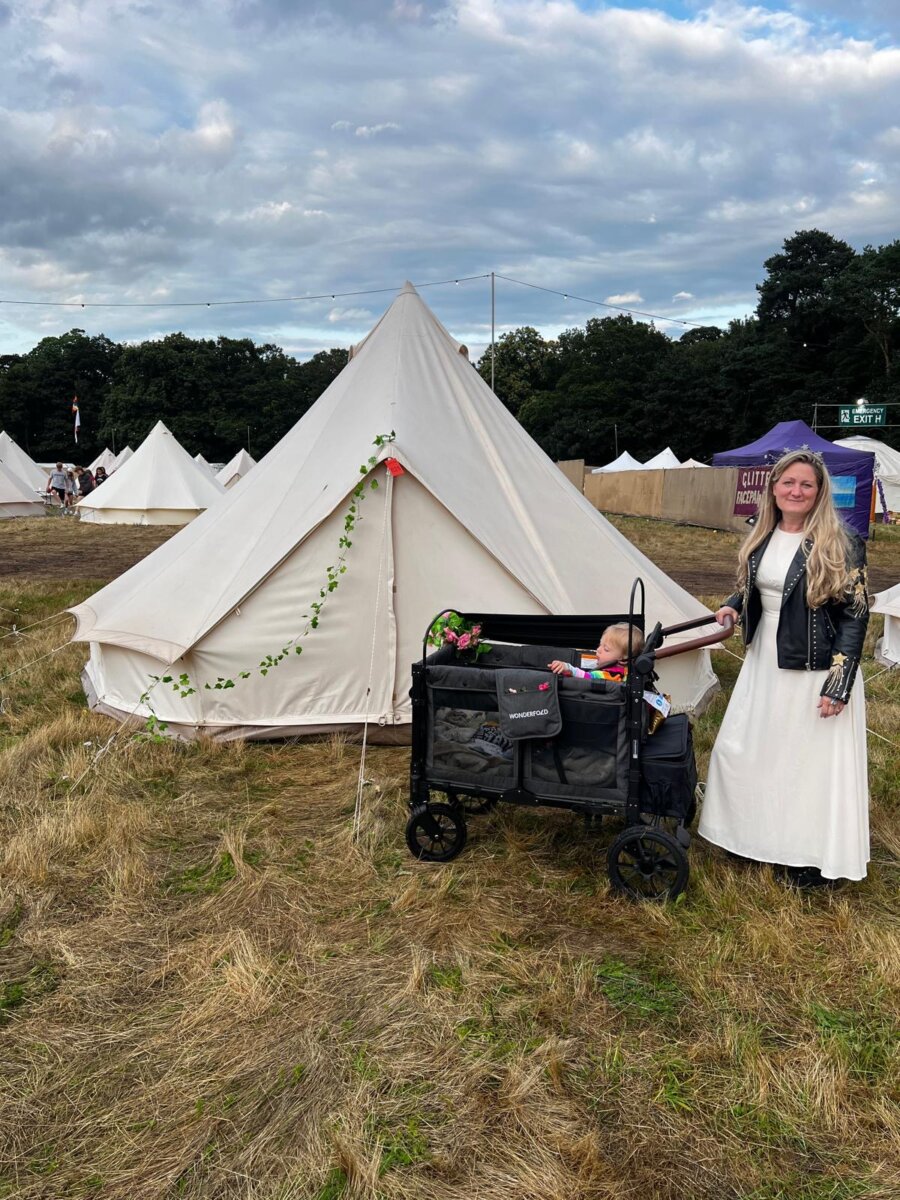 image of mother and baby outside a bell tent