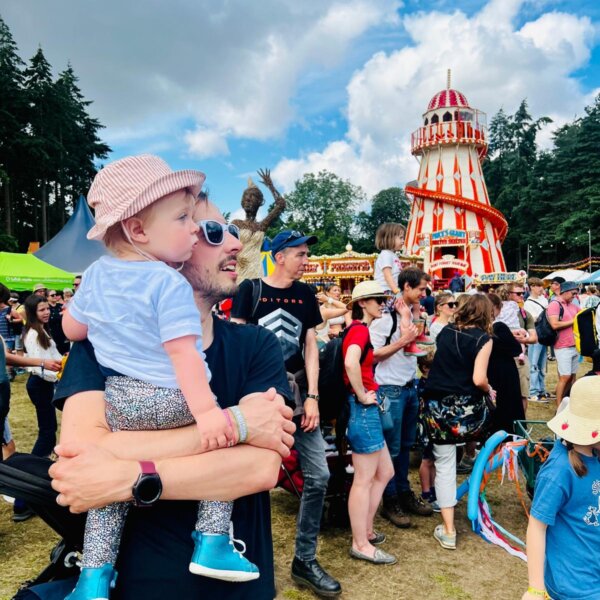 father and child by the helter skelter