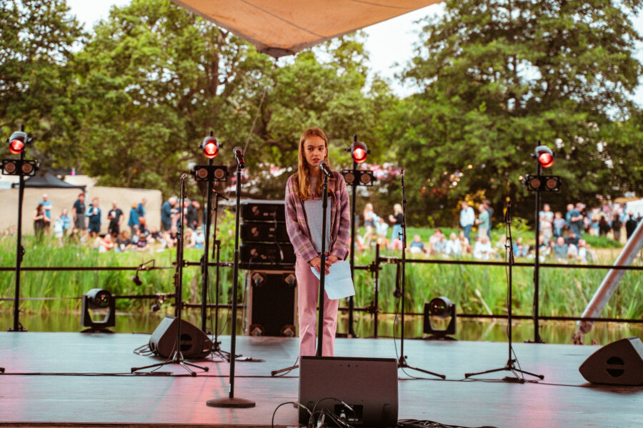 The winner of our Children's Poetry Competition, Anna, opening the festival with her poem on the Waterfront Stage