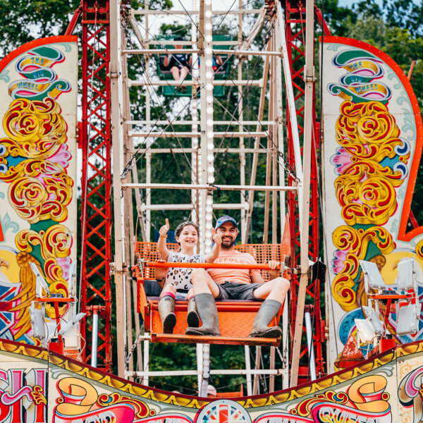 a father and daughter on the big wheel