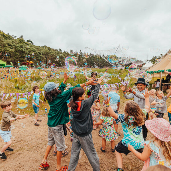 kids catching bubbles